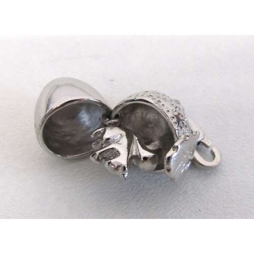 77 - Genuine Pandora bracelet and a collection of nine silver charms including opening.