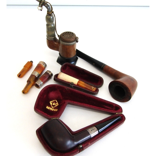 82 - Collection of vintage tobacciana including silver-mounted walnut pipe with fitted case, amber and si... 