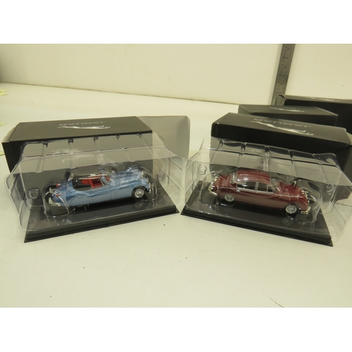 283 - A collection of Jaguar collectable diecast model cars etc.