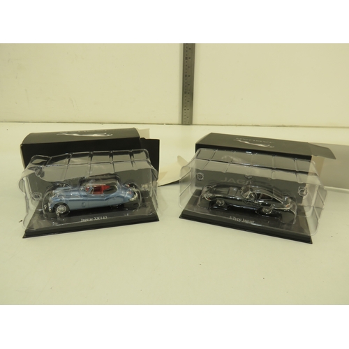 283 - A collection of Jaguar collectable diecast model cars etc.