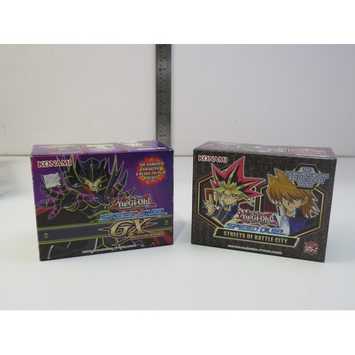 110 - Two boxes of Konami trading cards