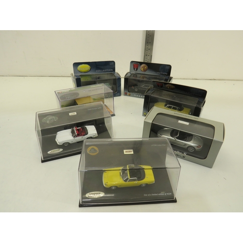 285 - Seven boxed diecast model cars.