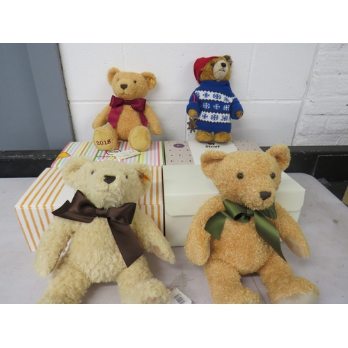 387 - Four boxed Steiff teddies