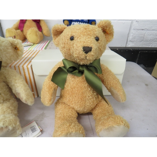 387 - Four boxed Steiff teddies