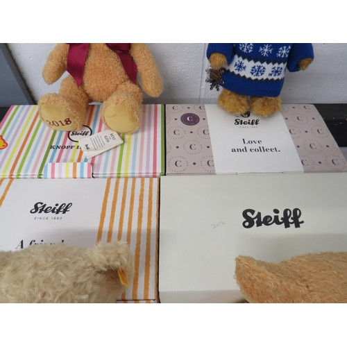 387 - Four boxed Steiff teddies