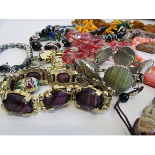 63 - Assorted jewellery and beads including gemstone.