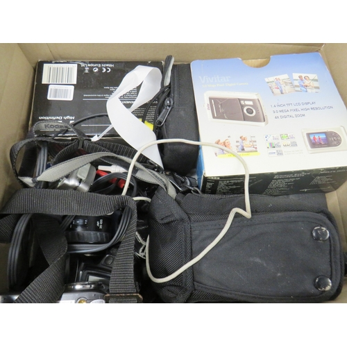 394 - Job lot of assorted cameras to include digital