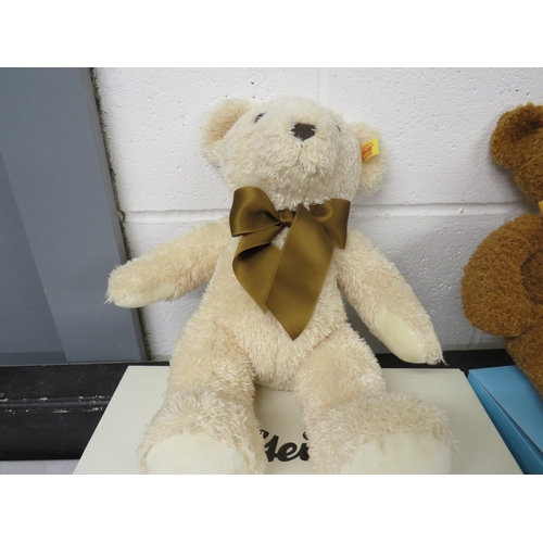 404 - Four boxed Steiff teddies