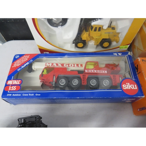 423 - Nine boxed construction vehicles to include Joal, Siku etc