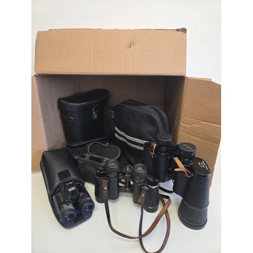 56 - Box of binoculars and opera covers