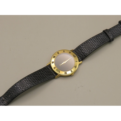 5 - Gucci watch with leather strap