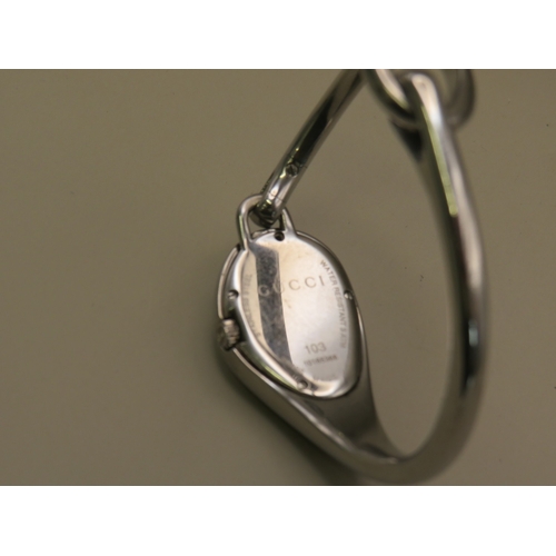 11 - Gucci bangle watch