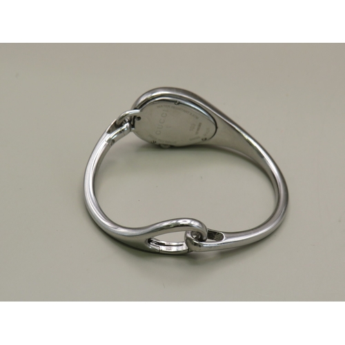 11 - Gucci bangle watch