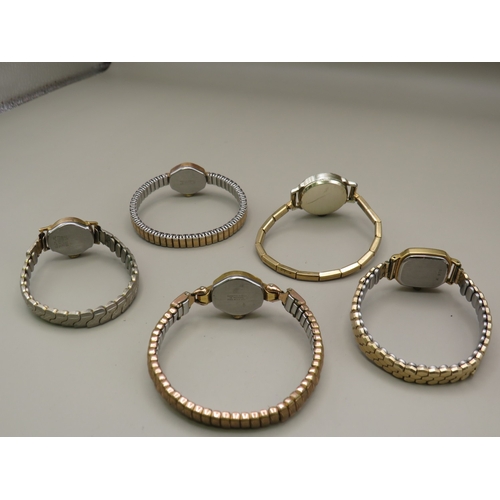 12 - Sevn assorted vintage ladies watches and two vintage watch heads to include Tissot, Bucherer, Raymon... 