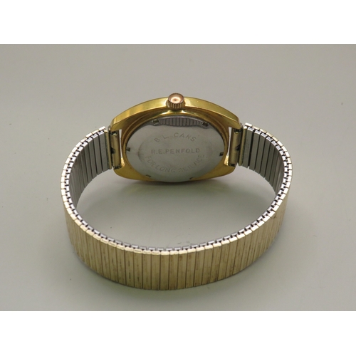 13 - Gold tone Garrard day date watch