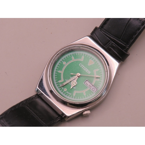 14 - Automatic Citizen watch with Arabic day date