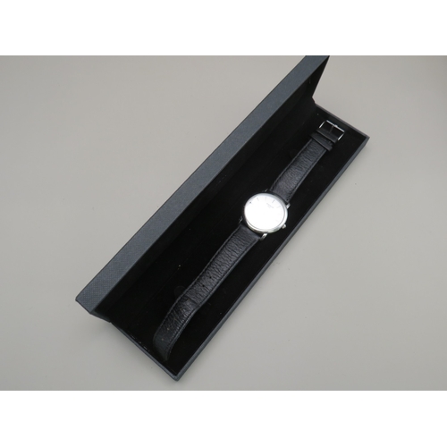 18 - Tissot watch with leather strap