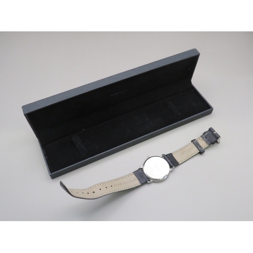 18 - Tissot watch with leather strap