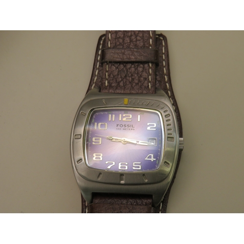 19 - Two Fossil watches with leather straps
