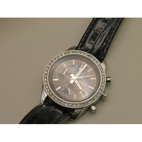 19 - Two Fossil watches with leather straps