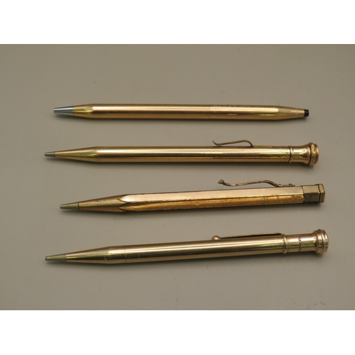 26 - Four vintage gold tone pens/ propelling pencils