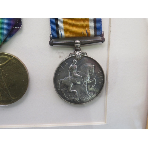 32 - Framed WWI & WWII medal set to include WWI trio awarded to 6279. Pte F.W. Mack. K. O. Sco. Bord.