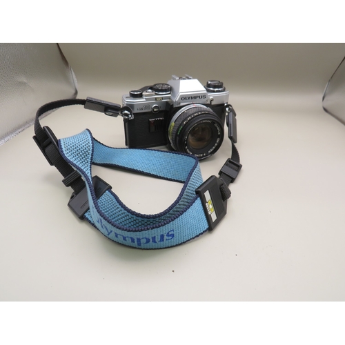 37 - Olympus OM10 camera