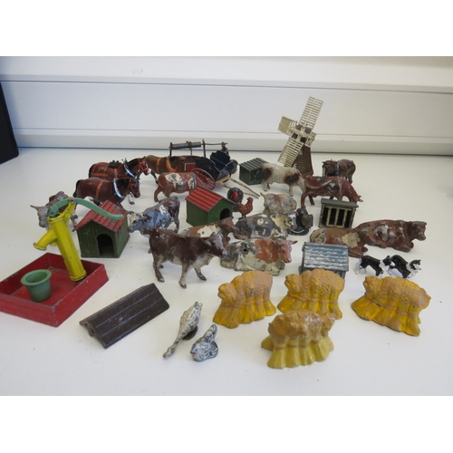 45 - Job lot of Britains farm animals and farm related accessories