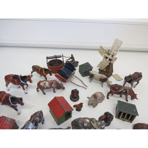 45 - Job lot of Britains farm animals and farm related accessories