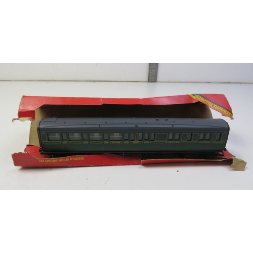 Five vintage boxed model trains.