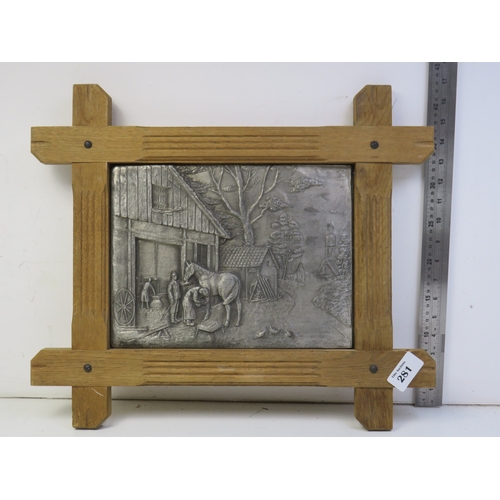 281 - Hand crafted German pewter (Zinn) relief panel set in a wooden frame and a copper relief framed plaq... 