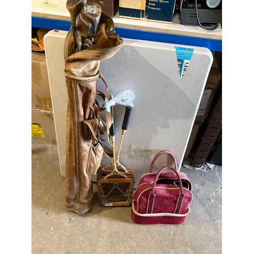 665 - Vintage/antique set of golf clubs, a set of bowls and two vintage tennis rackets