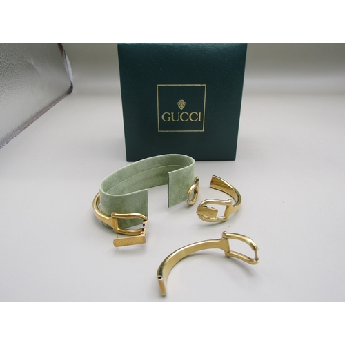 7 - Gold Tone Gucci watch with additional strap