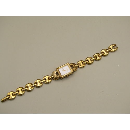 9 - Gold tone Gucci watch