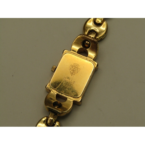 9 - Gold tone Gucci watch