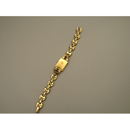9 - Gold tone Gucci watch