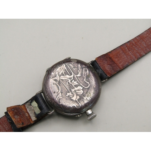 14 - Vintage ornate sterling silver watch with leather strap