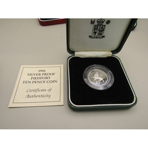21 - Five cased silver proof coins all with certificates of authenticity