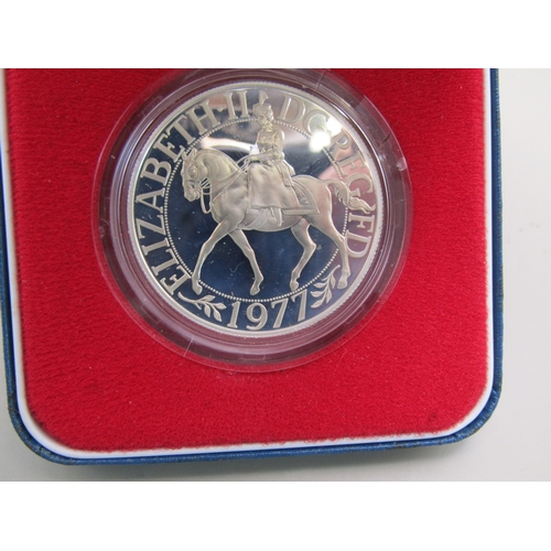 23 - Four cased sterling silver commemorative crowns