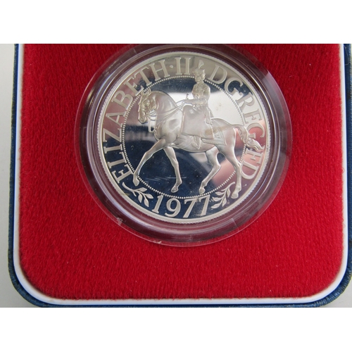 23 - Four cased sterling silver commemorative crowns
