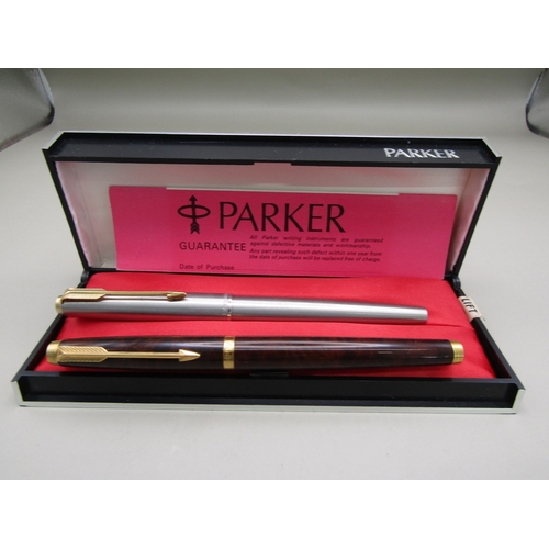 26 - Two 14kt nib Parker pens