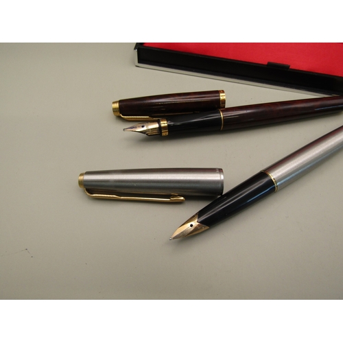 26 - Two 14kt nib Parker pens