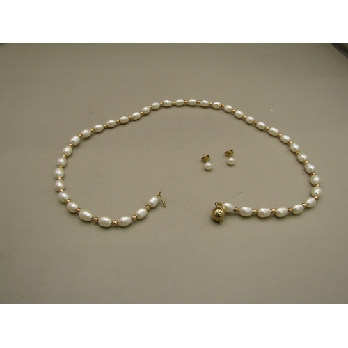 31 - 9ct gold and pearl necklace and earring set
