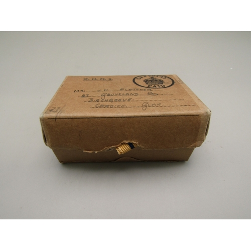 33 - Four WWII medals and a military pin badge with box