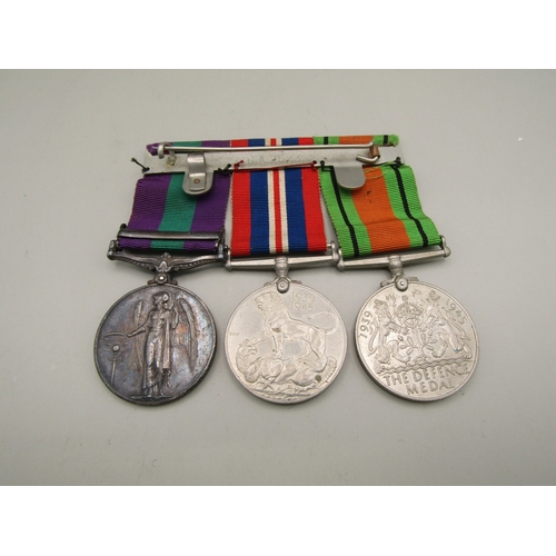 34 - Three medals including two WWII medals and a General Service Medal with Palestine 1945-48 clasp awar... 