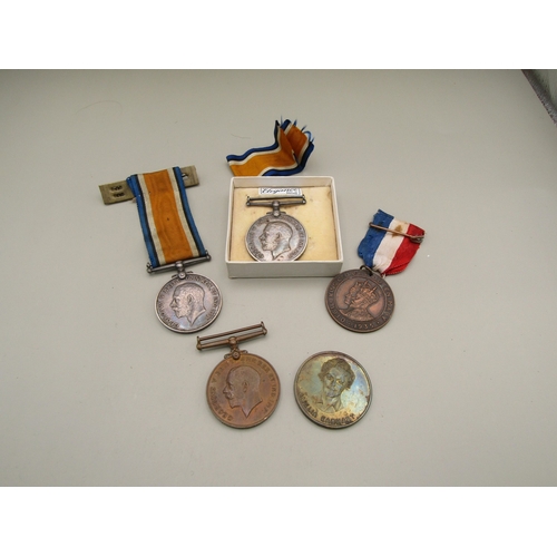 35 - Assortment of medals including to WWI British War medals awarded to:
301242 Pte. W.E. Jellyman. Tank... 