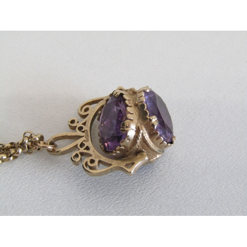 20F - Vintage 9ct gold amethyst spinner fob pendant on 9ct gold 20