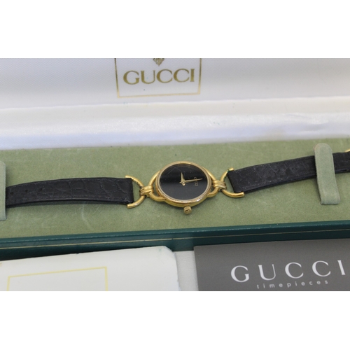 17 - Cased Gucci watch