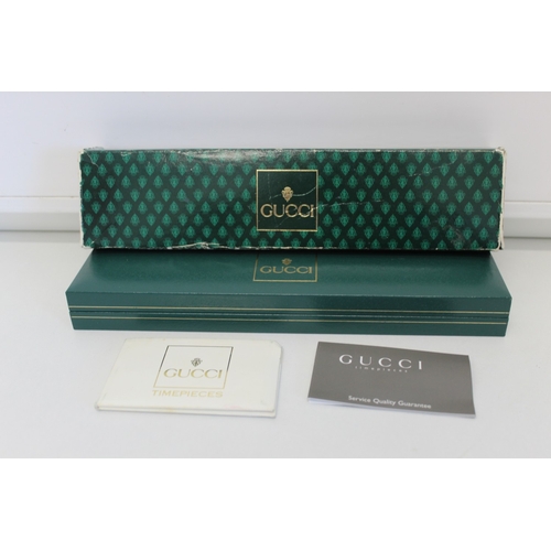 17 - Cased Gucci watch