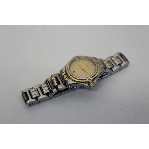 21 - Two tone Gucci watch